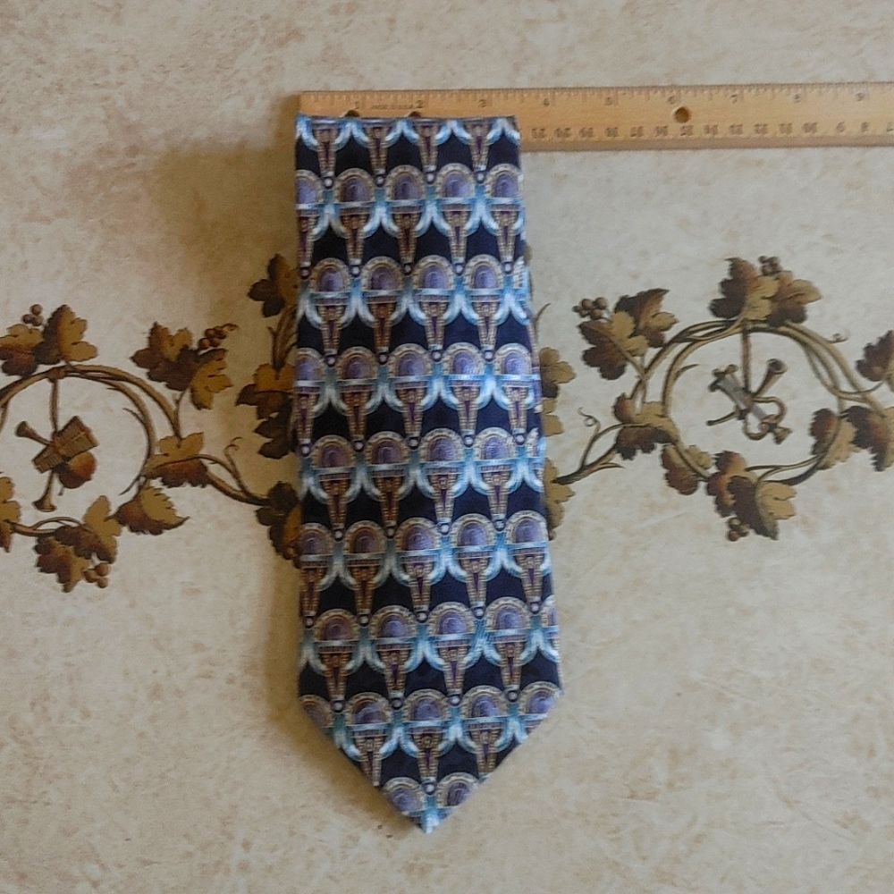 Vintage man's silk tie. PAVIA Italy. Black with purple, blue and gold design.